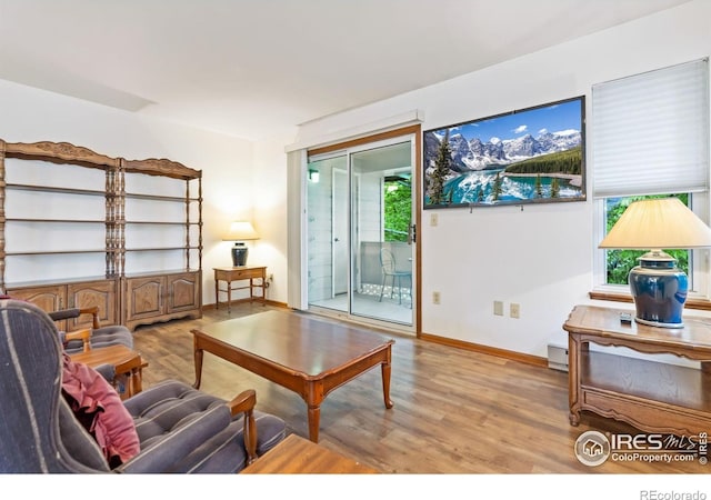 3500 Carlton Ave Unit 26, Fort Collins, CO 80525 - living area featuring wood finished floors and baseboards