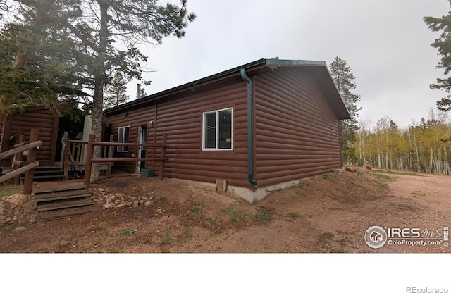 311 Chiricahua Cir, Red Feather Lakes, CO 80545 - view of side of home featuring log veneer siding