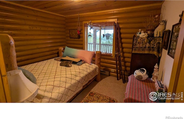 311 Chiricahua Cir, Red Feather Lakes, CO 80545 - bedroom with wood ceiling, log walls, and a baseboard radiator