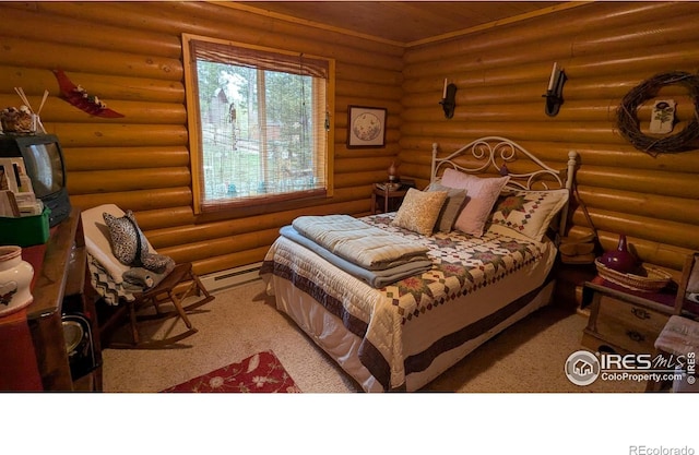 311 Chiricahua Cir, Red Feather Lakes, CO 80545 - bedroom featuring baseboard heating and wood ceiling