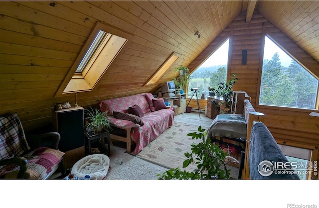 311 Chiricahua Cir, Red Feather Lakes, CO 80545 - bonus room with carpet, wood walls, wood ceiling, and lofted ceiling