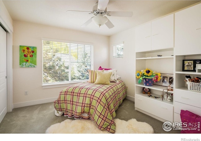 2758 Meadow Mountain Trl, Lafayette, CO 80026 - bedroom featuring carpet floors, baseboards, ceiling fan, and a closet