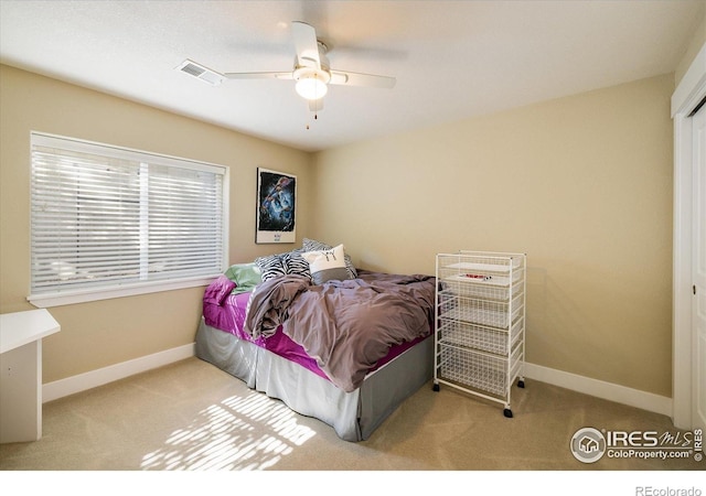 2758 Meadow Mountain Trl, Lafayette, CO 80026 - bedroom with carpet, baseboards, and a ceiling fan