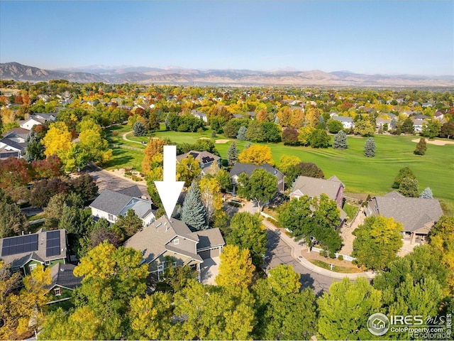 2758 Meadow Mountain Trl, Lafayette, CO 80026 - aerial perspective of suburban area featuring mountains and a local golf course