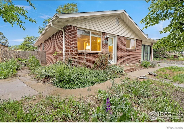 437 Fox St, Longmont, CO 80504 - view of front of home with brick siding