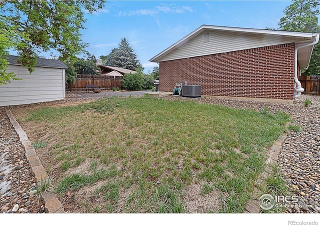 437 Fox St, Longmont, CO 80504 - view of yard featuring central AC