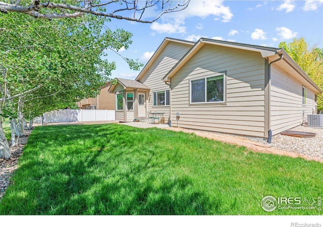 8734 19th Street Rd, Greeley, CO 80634 - rear view of house featuring central air condition unit