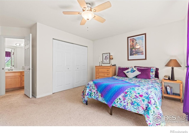 8734 19th Street Rd, Greeley, CO 80634 - bedroom featuring light carpet, a closet, ceiling fan, and baseboards