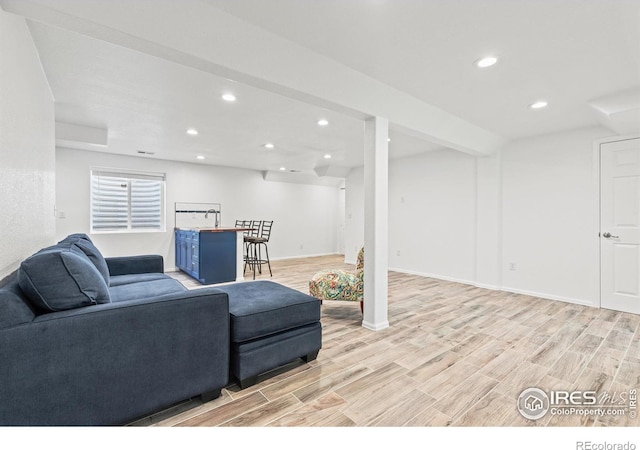 8734 19th Street Rd, Greeley, CO 80634 - living area with light wood-style floors, recessed lighting, and baseboards