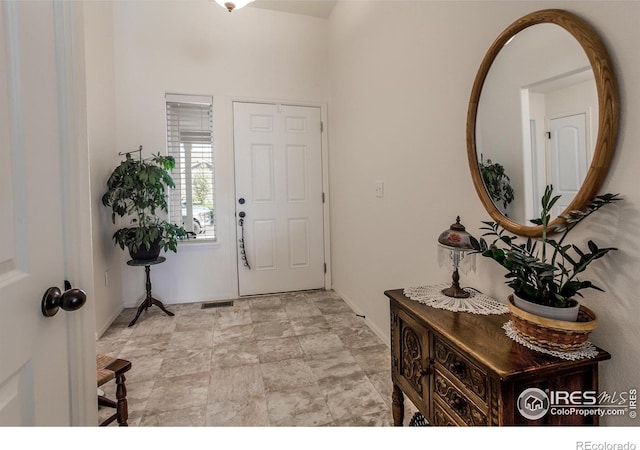 944 Maplebrook Dr, Windsor, CO 80550 - entryway featuring a towering ceiling