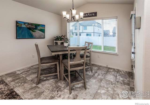 944 Maplebrook Dr, Windsor, CO 80550 - dining room with a chandelier, baseboards, and lofted ceiling