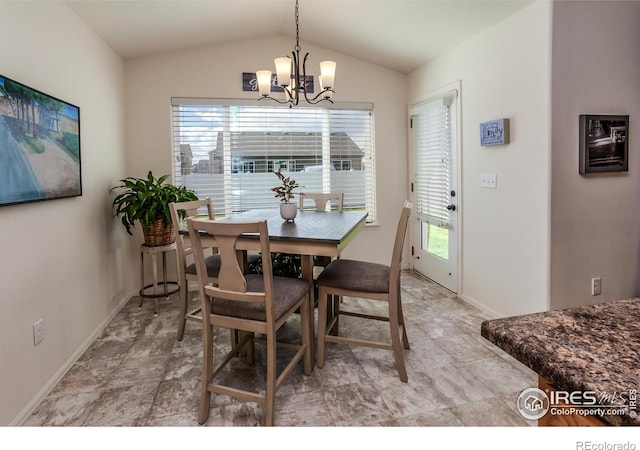 944 Maplebrook Dr, Windsor, CO 80550 - dining space with a chandelier, baseboards, and vaulted ceiling