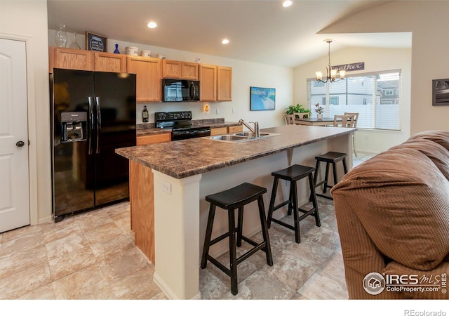 944 Maplebrook Dr, Windsor, CO 80550 - kitchen featuring black appliances, a sink, dark countertops, vaulted ceiling, and a chandelier