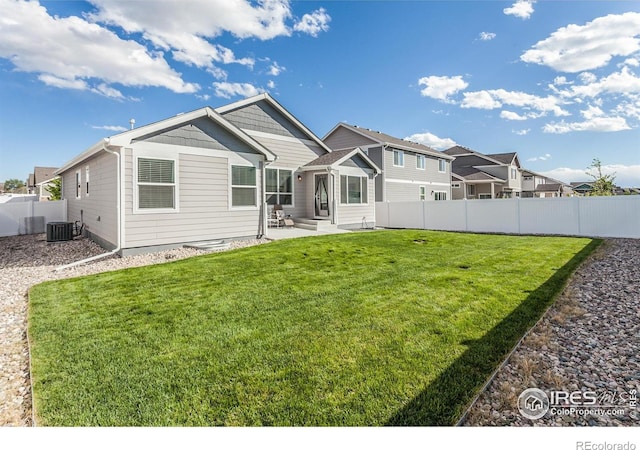 944 Maplebrook Dr, Windsor, CO 80550 - rear view of house with a patio, cooling unit, and entry steps