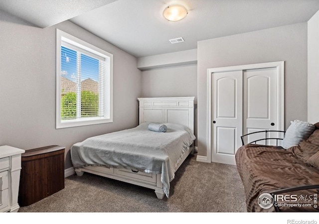 7427 Couples Ct, Fort Collins, CO 80528 - carpeted bedroom with a closet and baseboards