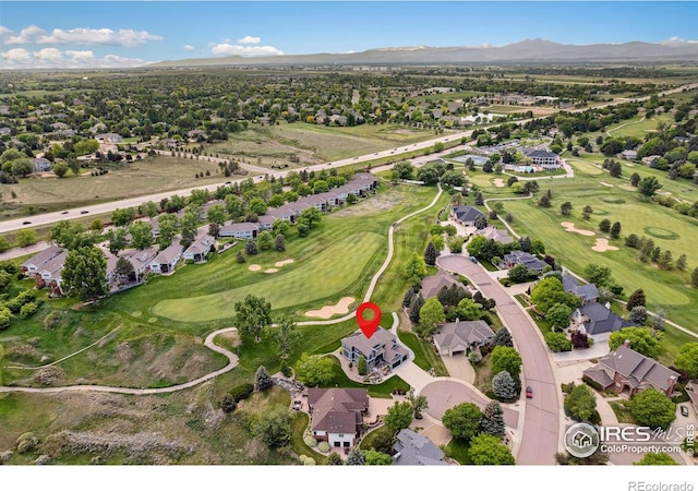 7427 Couples Ct, Fort Collins, CO 80528 - aerial view of property and surrounding area featuring mountains, nearby suburban area, and a local golf course