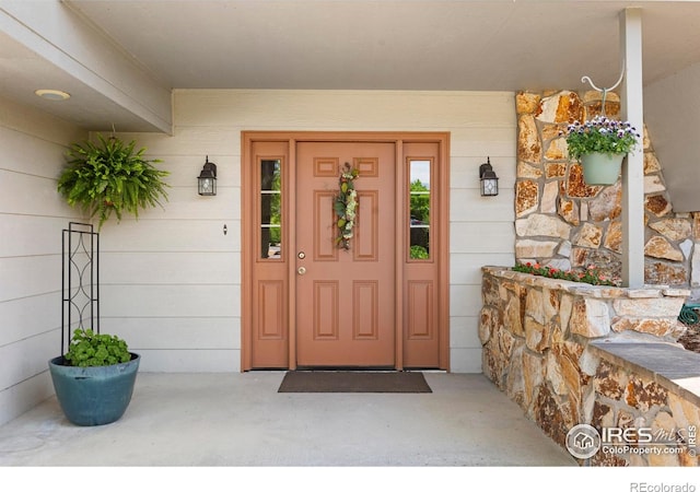 3804 Amy Pl, Loveland, CO 80538 - entrance to property featuring covered porch