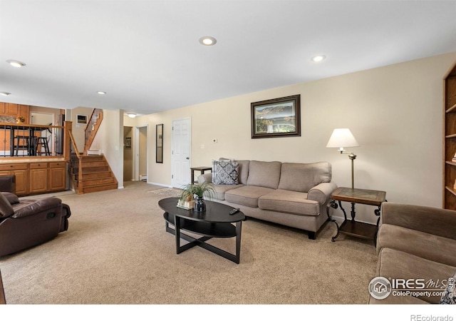 3804 Amy Pl, Loveland, CO 80538 - living area featuring light carpet, stairs, recessed lighting, and baseboards