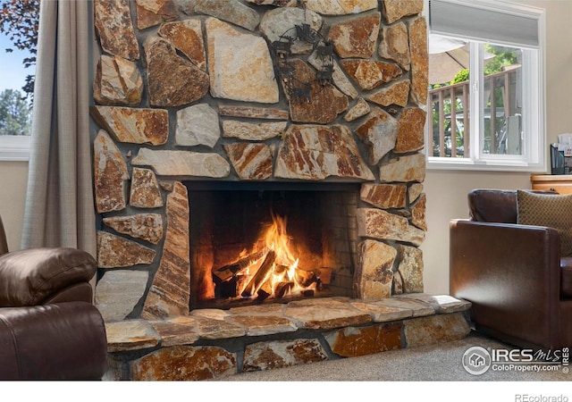 3804 Amy Pl, Loveland, CO 80538 - detailed view of a stone fireplace and carpet