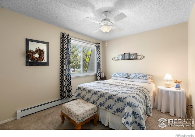 3804 Amy Pl, Loveland, CO 80538 - carpeted bedroom featuring a baseboard radiator, a textured ceiling, ceiling fan, and baseboards
