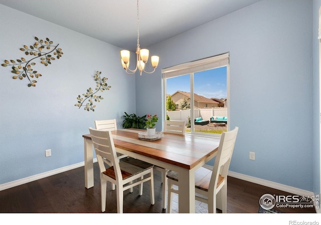 5664 Osbourne Dr, Windsor, CO 80550 - dining room with a chandelier, wood finished floors, and baseboards