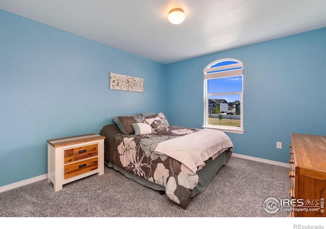 5664 Osbourne Dr, Windsor, CO 80550 - carpeted bedroom with baseboards