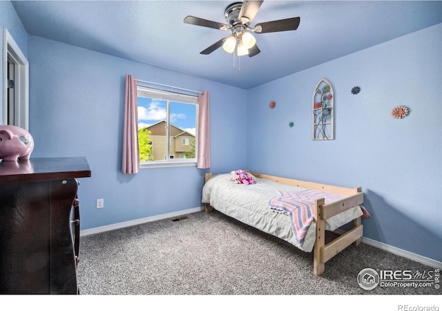 5664 Osbourne Dr, Windsor, CO 80550 - carpeted bedroom with baseboards and a ceiling fan