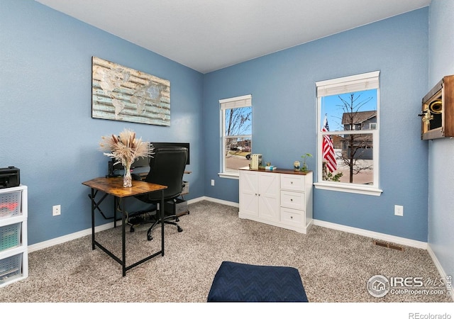 5664 Osbourne Dr, Windsor, CO 80550 - office area with light carpet and baseboards