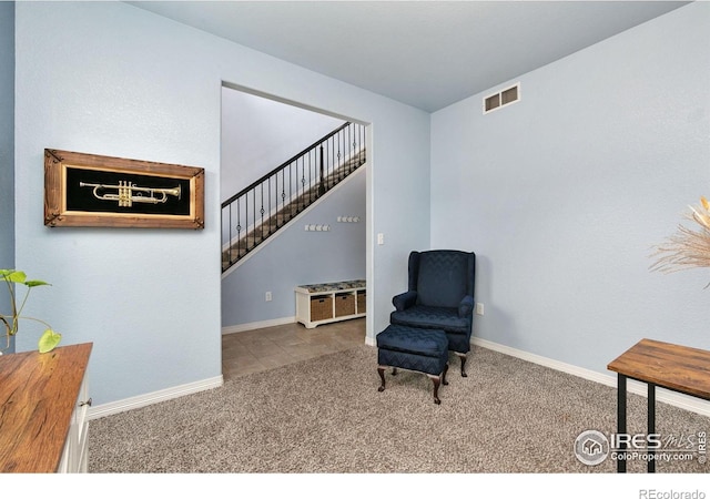 5664 Osbourne Dr, Windsor, CO 80550 - sitting room with carpet flooring, baseboards, and stairs