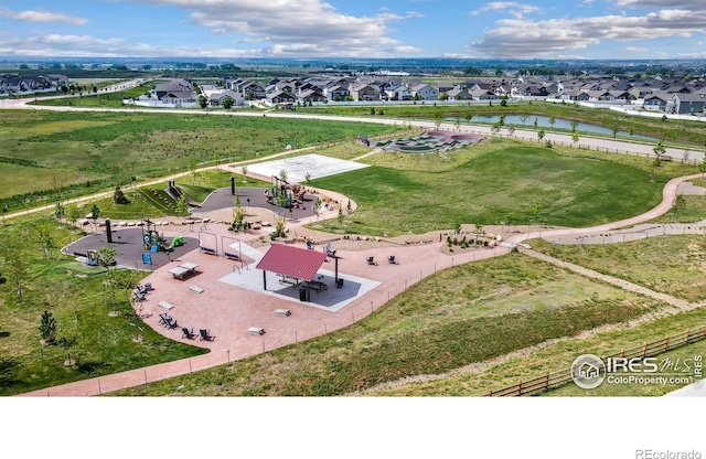 5664 Osbourne Dr, Windsor, CO 80550 - aerial view of residential area with a nearby body of water