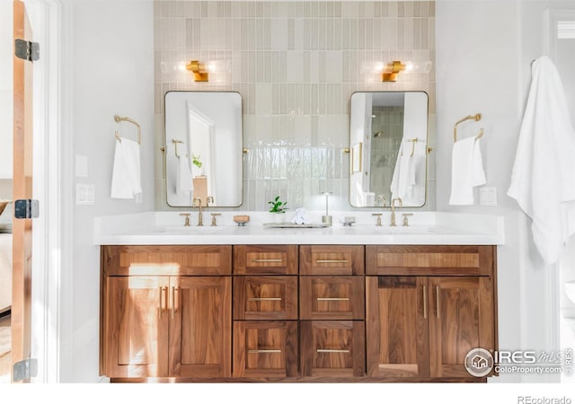 609 Corona Ct, Lafayette, CO 80026 - full bathroom featuring double vanity and a shower