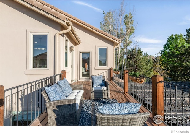 609 Corona Ct, Lafayette, CO 80026 - wooden terrace featuring an outdoor living space