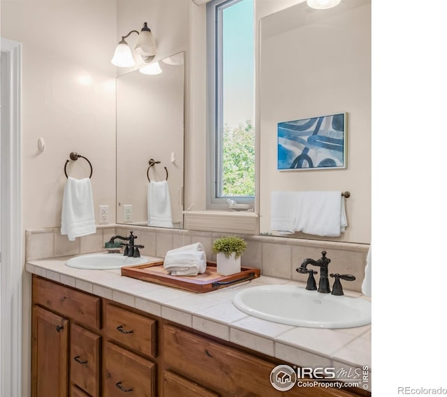 609 Corona Ct, Lafayette, CO 80026 - bathroom featuring double vanity