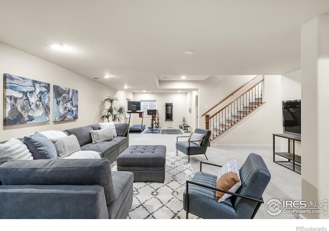 609 Corona Ct, Lafayette, CO 80026 - living area with light carpet, stairs, recessed lighting, and baseboards