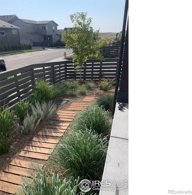 6211 Stable View St, Castle Pines, CO 80108 - view of yard featuring a residential view