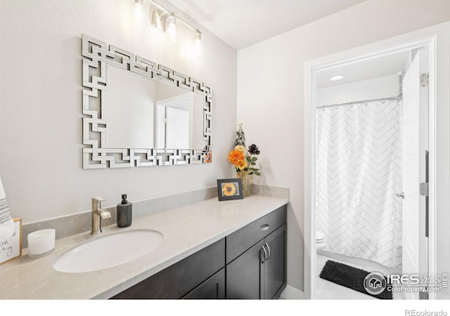 6211 Stable View St, Castle Pines, CO 80108 - full bathroom featuring toilet, vanity, and curtained shower