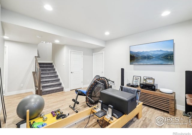 6211 Stable View St, Castle Pines, CO 80108 - exercise area featuring wood finished floors, recessed lighting, and baseboards