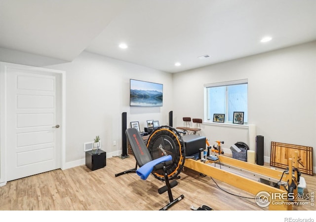 6211 Stable View St, Castle Pines, CO 80108 - exercise room featuring wood finished floors, recessed lighting, and baseboards