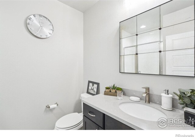 6211 Stable View St, Castle Pines, CO 80108 - bathroom with vanity and toilet