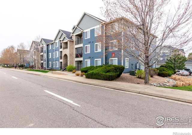 4451 S Ammons St Unit 307, Littleton, CO 80123 - view of front of house with a residential view