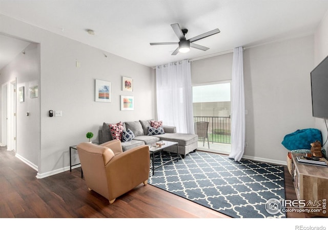 4451 S Ammons St Unit 307, Littleton, CO 80123 - living room with wood finished floors, a ceiling fan, and baseboards