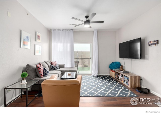 4451 S Ammons St Unit 307, Littleton, CO 80123 - living room featuring ceiling fan, wood finished floors, and baseboards