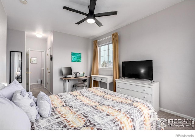4451 S Ammons St Unit 307, Littleton, CO 80123 - carpeted bedroom featuring baseboards and ceiling fan