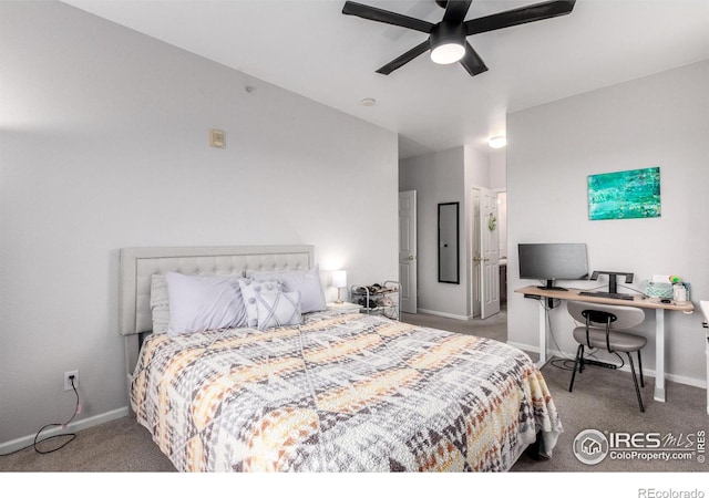 4451 S Ammons St Unit 307, Littleton, CO 80123 - bedroom featuring carpet flooring, baseboards, a desk, and a ceiling fan