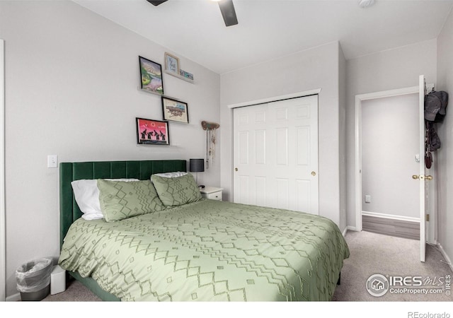 4451 S Ammons St Unit 307, Littleton, CO 80123 - bedroom with carpet flooring, baseboards, a closet, and ceiling fan