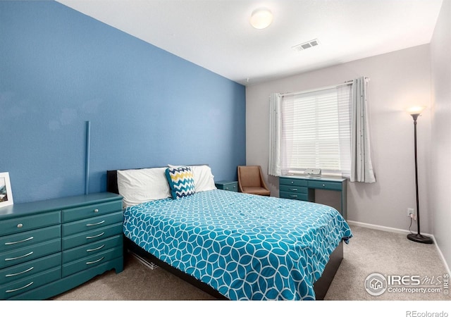 4451 S Ammons St Unit 307, Littleton, CO 80123 - carpeted bedroom featuring baseboards