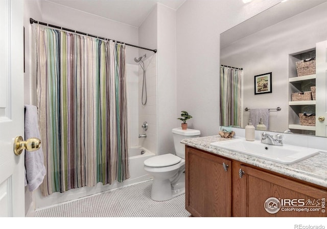 4451 S Ammons St Unit 307, Littleton, CO 80123 - bathroom with vanity, shower / bath combination with curtain, toilet, and tile patterned floors