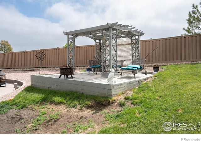 2085 Tundra Cir, Erie, CO 80516 - view of yard featuring an outdoor fire pit and a pergola