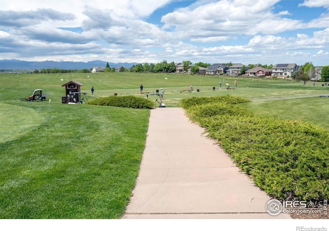 2085 Tundra Cir, Erie, CO 80516 - view of home's community with a lawn and a mountain view