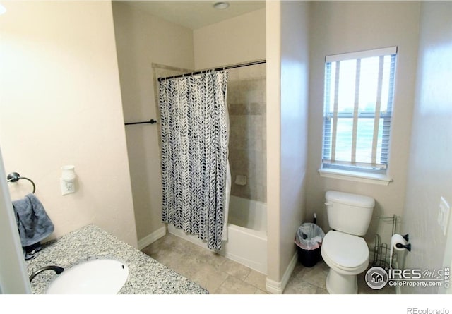 3106 Megan Way, Berthoud, CO 80513 - full bath featuring toilet, vanity, shower / tub combo with curtain, tile patterned floors, and baseboards